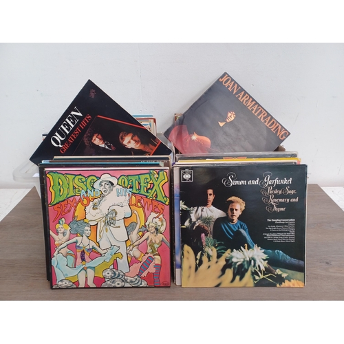 647 - Two boxes containing a collection LP vinyl records to include Elvis Presley, The Jam, Queen, The Bea... 