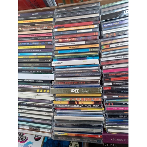 648 - A box containing a collection of CDs to include The Velvet Underground, Paul Weller, Cocteau Twins, ... 