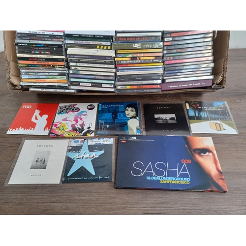 648 - A box containing a collection of CDs to include The Velvet Underground, Paul Weller, Cocteau Twins, ... 