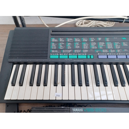 655 - Two Yamaha electronic home keyboards, one PSR-150 with stand and one VSS-200