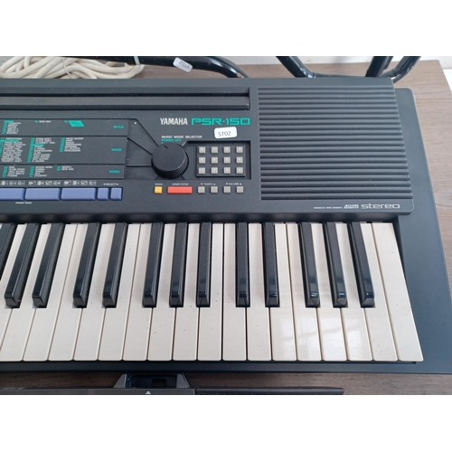 655 - Two Yamaha electronic home keyboards, one PSR-150 with stand and one VSS-200