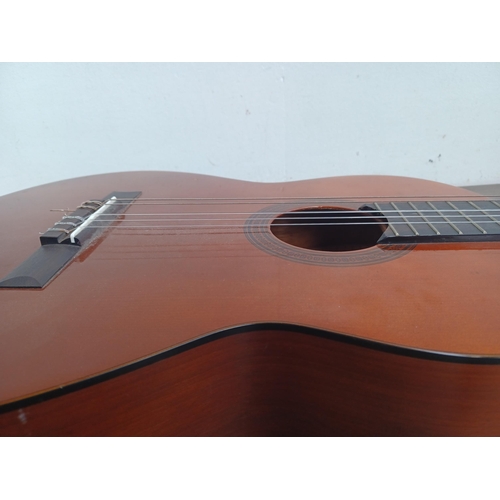 668 - A Yamaha CG-70 nylon strung classical guitar