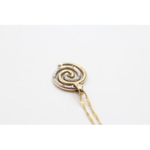 1181 - A 9ct gold diamond set spiral pendant necklace - approx. gross weight 2.5 grams