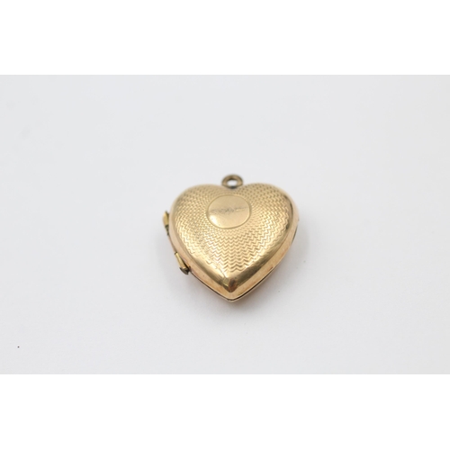 1007 - Three 9ct gold back and front engraved heart shaped lockets - approx. gross weight 7.3 grams