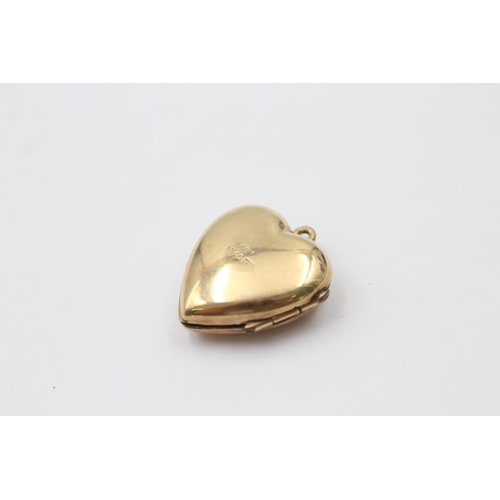 1007 - Three 9ct gold back and front engraved heart shaped lockets - approx. gross weight 7.3 grams