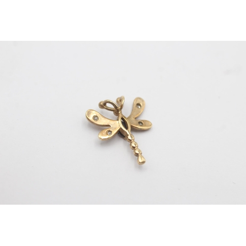 1011 - A 9ct gold sapphire and diamond dragonfly pendant - approx. gross weight 1 gram