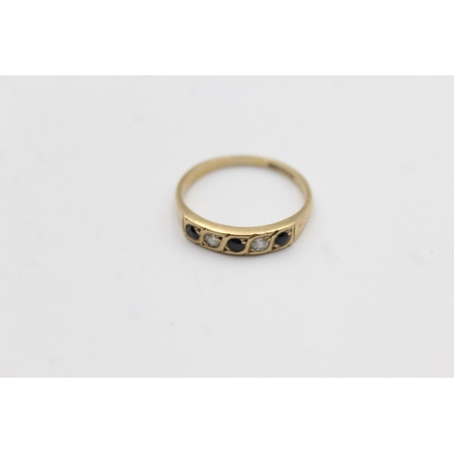 1015 - A 9ct gold diamond and sapphire five stone ring - approx. gross weight 1.8 grams