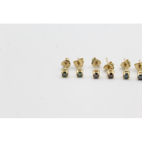 1019 - Three pairs of 9ct gold enhanced coloured diamond stud earrings - approx. gross weight 1.4 grams