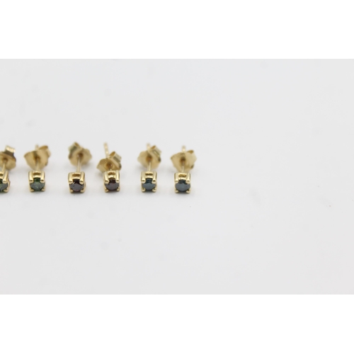 1019 - Three pairs of 9ct gold enhanced coloured diamond stud earrings - approx. gross weight 1.4 grams