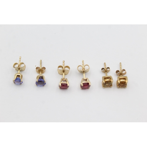 1020 - Three pairs of 9ct gold gemstone earrings, one tanzanite, one glass filled ruby and one citrine - ap... 