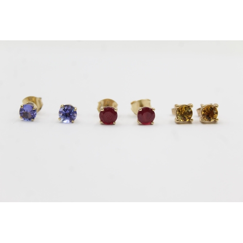 1020 - Three pairs of 9ct gold gemstone earrings, one tanzanite, one glass filled ruby and one citrine - ap... 