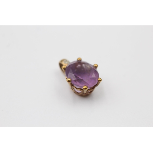 1026 - Five 9ct gold gemstone set pendants, one amethyst, one diamond and amethyst, two garnet and one emer... 