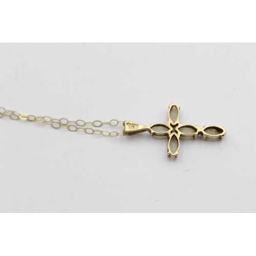 1034 - A 9ct gold opal cross pendant necklace - approx. gross weight 1.4 grams and 20.5cm long when fastene... 