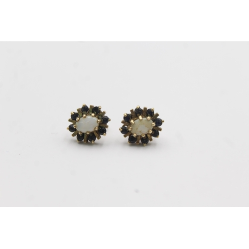 1037 - A pair of 9ct gold opal and sapphire halo cluster earrings - approx. gross weight 2.4 grams