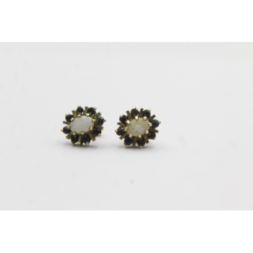 1037 - A pair of 9ct gold opal and sapphire halo cluster earrings - approx. gross weight 2.4 grams