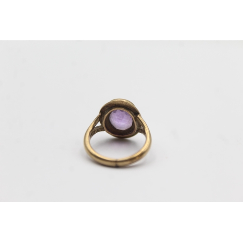 1041 - A 9ct gold amethyst solitaire ring - approx. gross weight 3 grams