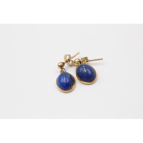 1045 - Two pairs of 9ct gold earrings, one lapis lazuli and one coral - approx. gross weight 3.3 grams