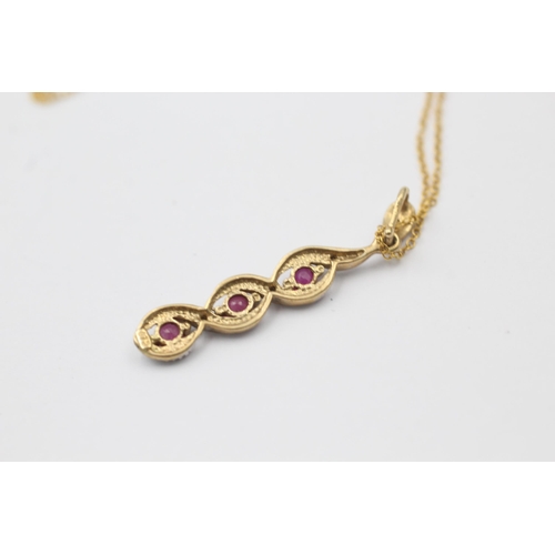 1048 - A 9ct gold diamond and ruby pendant necklace - approx. gross weight 1.8 grams