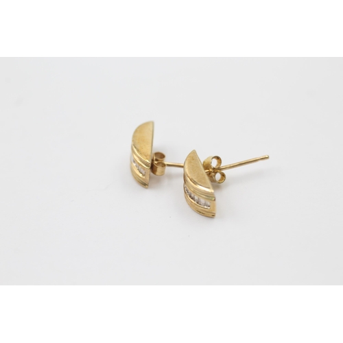 1049 - A pair of 9ct gold diamond earrings - approx. gross weight 1.7 grams