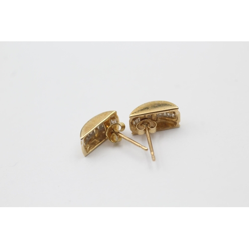 1049 - A pair of 9ct gold diamond earrings - approx. gross weight 1.7 grams