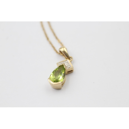 1050 - A 9ct gold diamond and peridot pendant necklace - approx. gross weight 2.8 grams