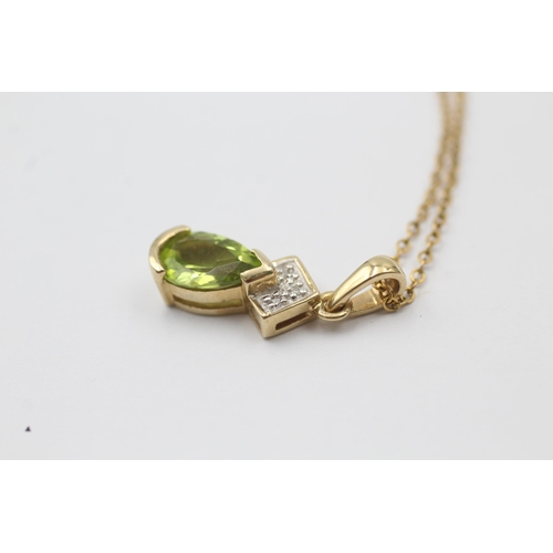 1050 - A 9ct gold diamond and peridot pendant necklace - approx. gross weight 2.8 grams