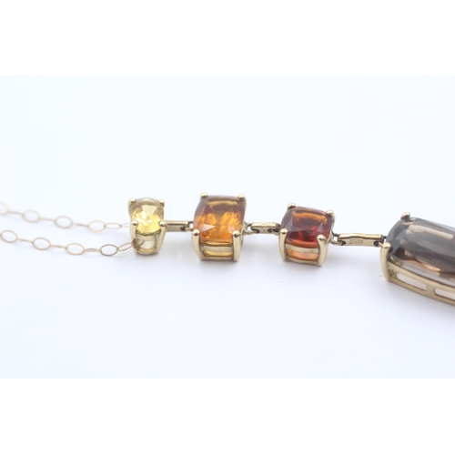 1066 - A 9ct gold smoky quartz and citrine pendant necklace - approx. gross weight 3.4 grams