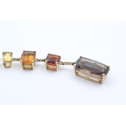 1066 - A 9ct gold smoky quartz and citrine pendant necklace - approx. gross weight 3.4 grams