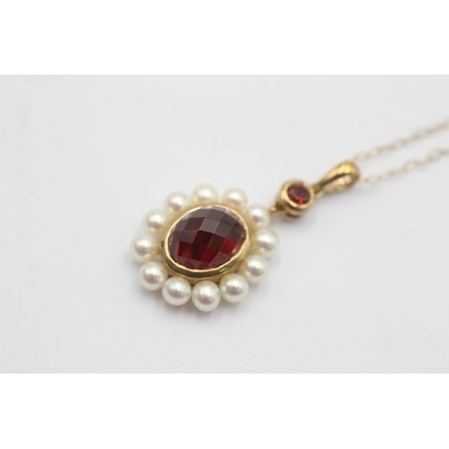 1070 - A 9ct gold faceted garnet and pearl cluster pendant necklace - approx. gross weight 2.9 grams