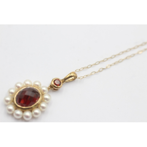 1070 - A 9ct gold faceted garnet and pearl cluster pendant necklace - approx. gross weight 2.9 grams