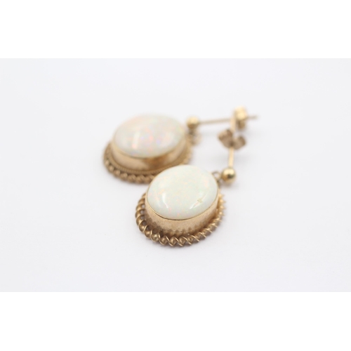 1078 - A pair of 9ct gold opal earrings - approx. gross weight 2.7 grams