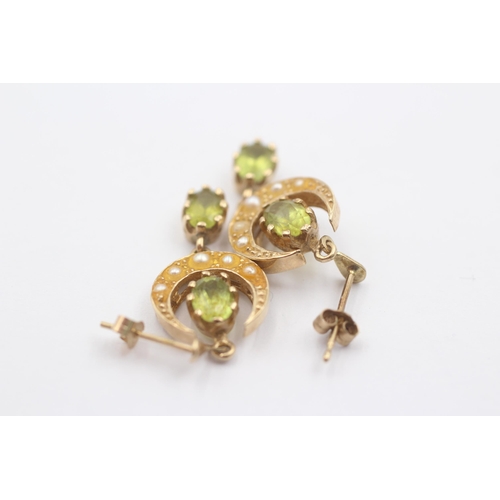 1079 - A pair of 9ct gold peridot and pearl crescent moon drop earrings - approx. gross weight 3.4 grams