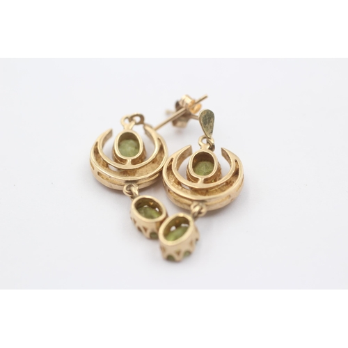 1079 - A pair of 9ct gold peridot and pearl crescent moon drop earrings - approx. gross weight 3.4 grams