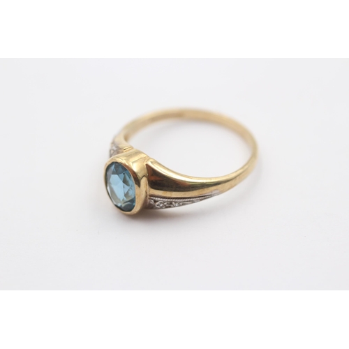 1084 - A 9ct gold blue topaz and diamond dress ring - approx. gross weight 2.8 grams