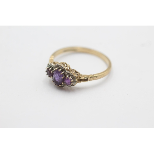 1087 - A 9ct gold amethyst and diamond triple stone halo dress ring - approx. gross weight 2.1 grams