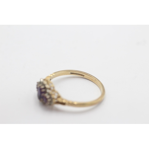 1087 - A 9ct gold amethyst and diamond triple stone halo dress ring - approx. gross weight 2.1 grams