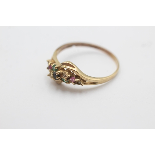 1089 - A 9ct gold ruby, sapphire, emerald and diamond stylised twist setting ring - approx. gross weight 2.... 