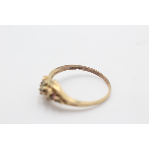 1089 - A 9ct gold ruby, sapphire, emerald and diamond stylised twist setting ring - approx. gross weight 2.... 