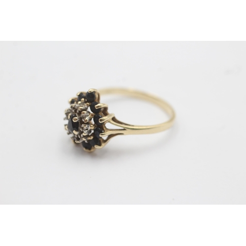 1093 - A 9ct gold sapphire and diamond cluster dress ring - approx. gross weight 2.4 grams