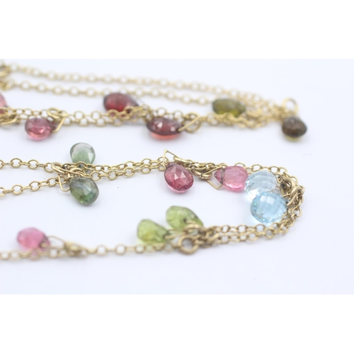 1097 - A 9ct gold faceted garnet, topaz, amethyst and tourmaline necklace - approx. gross weight 8.5 grams