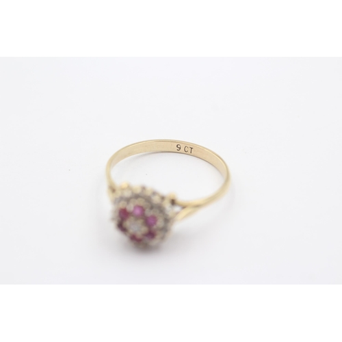 1101 - A 9ct gold diamond and ruby cluster dress ring - approx. gross weight 2.3 grams