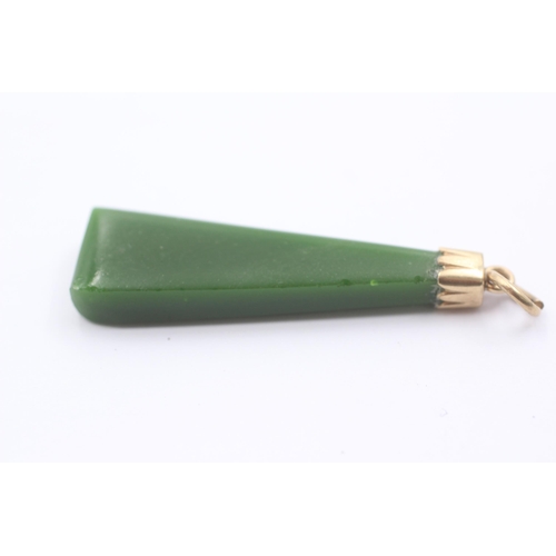 1103 - A 6ct gold green paste pendant - approx. gross weight 5.9 grams