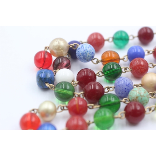 1107 - A 9ct gold multi-coloured glass beads single strand necklace - approx. gross weight 79.1 grams