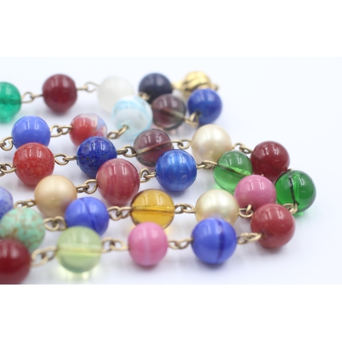 1107 - A 9ct gold multi-coloured glass beads single strand necklace - approx. gross weight 79.1 grams