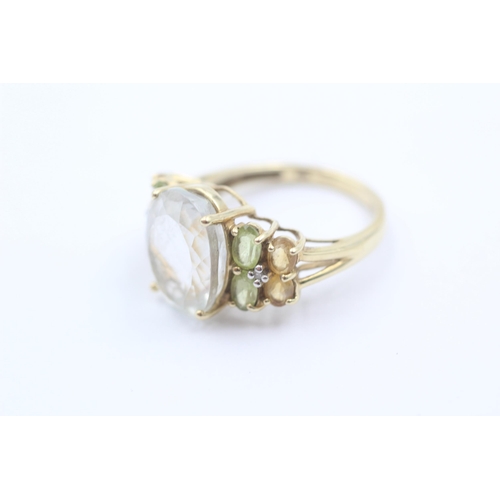 1110 - A 10ct gold topaz, citrine, peridot and diamond cluster dress ring - approx. gross weight 5.2 grams