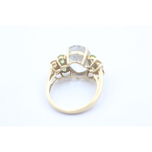 1110 - A 10ct gold topaz, citrine, peridot and diamond cluster dress ring - approx. gross weight 5.2 grams