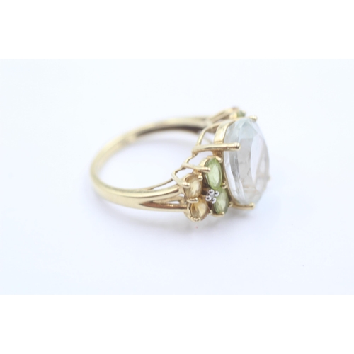 1110 - A 10ct gold topaz, citrine, peridot and diamond cluster dress ring - approx. gross weight 5.2 grams