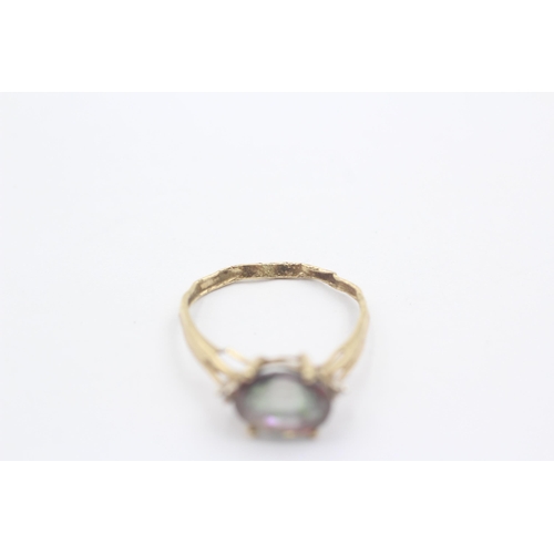 1114 - A 9ct gold coated topaz and diamond trilogy dress ring - approx. gross weight 1.8 grams