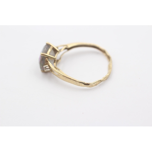 1114 - A 9ct gold coated topaz and diamond trilogy dress ring - approx. gross weight 1.8 grams