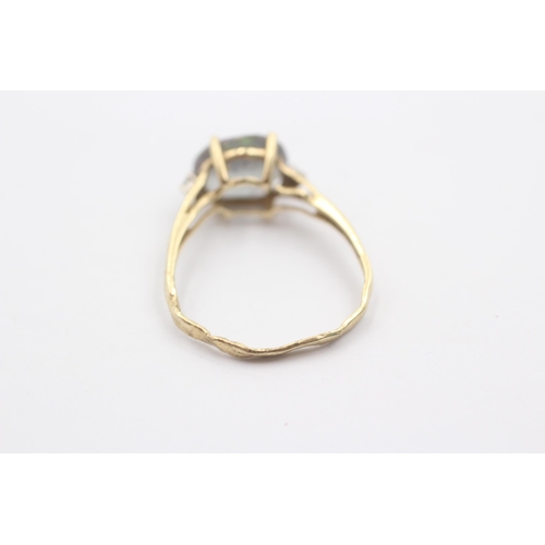 1114 - A 9ct gold coated topaz and diamond trilogy dress ring - approx. gross weight 1.8 grams